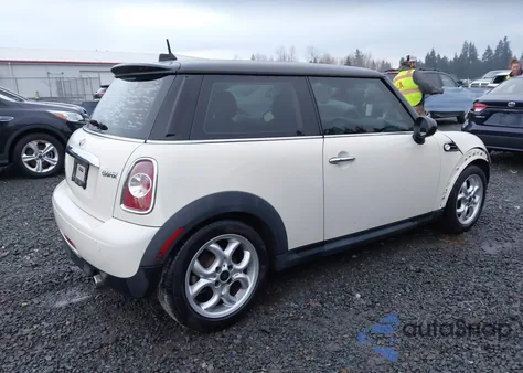 2011 Mini Cooper z USA, uszkodzony, nr VIN WMWSU3C5XBT098295